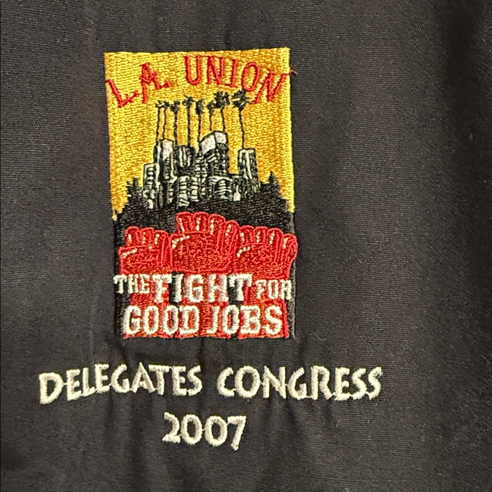 Vintage bomber jacket with "LA UNION TIGHTS GOOD JOBS DELEGATES CONGRESS 2007"